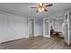 Large bedroom featuring double closets, updated flooring, and neutral paint at 1167 John D Winstead Rd, Roxboro, NC 27574