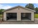 A large, two-car detached garage offers ample space for vehicles and storage at 1167 John D Winstead Rd, Roxboro, NC 27574