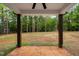 Backyard featuring view of tree line at 125 Oswego Dr, Louisburg, NC 27549