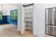 Pantry with shelving and sliding door offers plenty of storage space at 125 Oswego Dr, Louisburg, NC 27549
