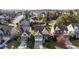 Aerial view of a neighborhood showcasing well-maintained homes and landscaping at 130 Virginia Water Dr, Rolesville, NC 27571