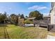 Backyard features a pergola and landscaped lawn at 130 Virginia Water Dr, Rolesville, NC 27571