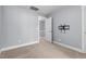 Neutral bedroom features plush carpet and a TV mount at 130 Virginia Water Dr, Rolesville, NC 27571