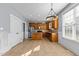 Bright kitchen features stainless steel appliances, granite counters, tile floors, and ample cabinet space at 130 Virginia Water Dr, Rolesville, NC 27571