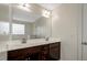 Bathroom featuring double vanity, large mirror, and tiled flooring at 131 Hawick Ct, Zebulon, NC 27597