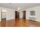 A Primary bedroom with hardwood floors and natural light at 1541 Caswell St, Raleigh, NC 27608