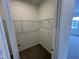 Walk-in closet with wire shelving at 1945 Plott Balsam Dr, Wendell, NC 27591