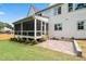 A beautiful backyard patio and screened in porch create a great outdoor living space at 217 Dublin Rd, Raleigh, NC 27609