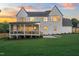 Large screened porch and patio overlooking the green lawn for enjoying outdoors at 217 Dublin Rd, Raleigh, NC 27609