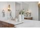 Bathroom featuring a large mirror, white countertop, stylish fixtures, and sleek wood vanity at 217 Dublin Rd, Raleigh, NC 27609