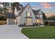 Beautifully landscaped home with a well manicured lawn and a three car garage for ample parking at 217 Dublin Rd, Raleigh, NC 27609