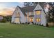 Charming two-story home with professional landscaping and a freshly cut lawn at 217 Dublin Rd, Raleigh, NC 27609