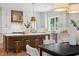 Modern kitchen featuring large island with seating and stainless steel appliances at 217 Dublin Rd, Raleigh, NC 27609