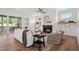 Cozy living room with fireplace, hardwood floors, and access to outdoor living at 217 Dublin Rd, Raleigh, NC 27609