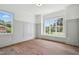 Empty room with hardwood floors, a window seat and ample sunlight at 217 Dublin Rd, Raleigh, NC 27609