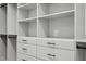 Close up of walk-in closet shelving and drawers at 217 Dublin Rd, Raleigh, NC 27609