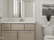 A modern bathroom with neutral colors at 217 Leland Crest Dr, Apex, NC 27539