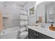 The bright bathroom features modern fixtures, a shower-tub combo, and sleek countertops at 248 Speight Branch Rd, Cary, NC 27518