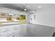 A spacious garage with a shiny floor featuring a view of the house exterior at 248 Speight Branch Rd, Cary, NC 27518