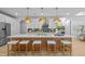The gourmet kitchen boasts a large center island with counter seating and stainless steel appliances at 248 Speight Branch Rd, Cary, NC 27518