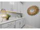 The laundry room features a sink, white cabinets, and stylish decor at 248 Speight Branch Rd, Cary, NC 27518