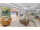 Open-concept living area flows seamlessly to the kitchen and outdoor patio with fireplace at 248 Speight Branch Rd, Cary, NC 27518