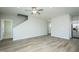Open living room with hard wood floors, a staircase, fresh paint, and lots of light at 2803 Ricolden Trl, Elon, NC 27244