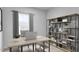 Bright and functional office space featuring a sleek desk, modern shelving, and ample natural light for productivity at 2875 Foster Woods Dr, Apex, NC 27502