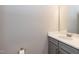 Neutral bathroom featuring a gray vanity and white countertop offering a serene and modern aesthetic at 3001 Sadie Hopkins St, Raleigh, NC 27616