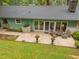 Inviting patio area with comfortable seating, offering a perfect spot for outdoor relaxation and entertaining at 402 Forest Rd, Oxford, NC 27565