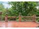 Brick deck bordered with a short wood and brick railing at 414 Bakewell Ct, Wake Forest, NC 27587