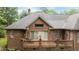 The beautiful brick home features a nice back patio with sliding glass doors at 414 Bakewell Ct, Wake Forest, NC 27587