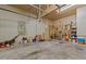 Spacious garage with tools hanging on the wall and a window at 414 Bakewell Ct, Wake Forest, NC 27587