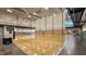 Spacious gymnasium featuring a volleyball court and ample natural light at 414 Bakewell Ct, Wake Forest, NC 27587