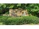Stone community sign with the words: OLDE MILL STREAM at 414 Bakewell Ct, Wake Forest, NC 27587