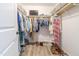 Walk-in closet with organized shelving, hanging racks, and ample storage for clothing and accessories at 420 E Grandview Ave, Liberty, NC 27298
