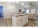 Spacious kitchen island overlooking the living area, promoting an inclusive living space at 420 E Grandview Ave, Liberty, NC 27298