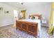 Spacious main bedroom featuring wood furniture, decorative rug, and stylish curtains at 420 E Grandview Ave, Liberty, NC 27298