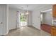 Eat-in kitchen area features sliding glass doors leading to backyard with lots of natural light at 4213 Stoneford Trace Dr, Raleigh, NC 27616