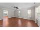 Spacious living room boasts gleaming hardwood floors and lots of natural light at 4213 Stoneford Trace Dr, Raleigh, NC 27616