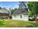 This house has a cozy backyard perfect for relaxing or entertaining guests at 5006 Silhouette Dr, Durham, NC 27713