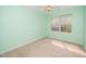Cozy bedroom with a ceiling fan and carpet, ready for your personal touch at 5006 Silhouette Dr, Durham, NC 27713
