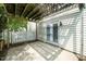 Covered back patio with access to the home and backyard at 5006 Silhouette Dr, Durham, NC 27713