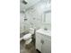 Bathroom featuring modern tiling, glass shower and white vanity at 505 E Canary St, Dunn, NC 28334