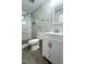 Bathroom featuring modern tiling, glass shower and white vanity at 505 E Canary St, Dunn, NC 28334