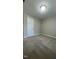 Cozy bedroom featuring neutral walls, new carpet, and modern lighting at 505 E Canary St, Dunn, NC 28334