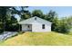 Charming single story home with white siding and well manicured yard at 505 E Canary St, Dunn, NC 28334
