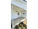 Comfortable covered front porch with ceiling light and mailbox at 505 E Canary St, Dunn, NC 28334