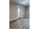 Inviting living room area featuring durable flooring and plenty of natural light at 505 E Canary St, Dunn, NC 28334