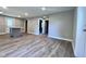Inviting living room area featuring durable flooring and plenty of natural light at 505 E Canary St, Dunn, NC 28334